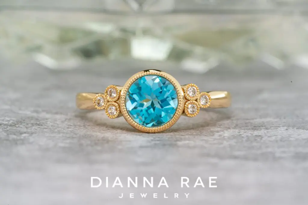 14K Yellow Gold Blue Topaz Ring with Diamond Accents