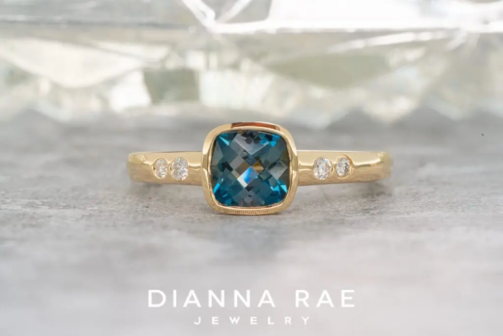 14K Yellow Gold Blue Topaz Ring with Diamond Accents