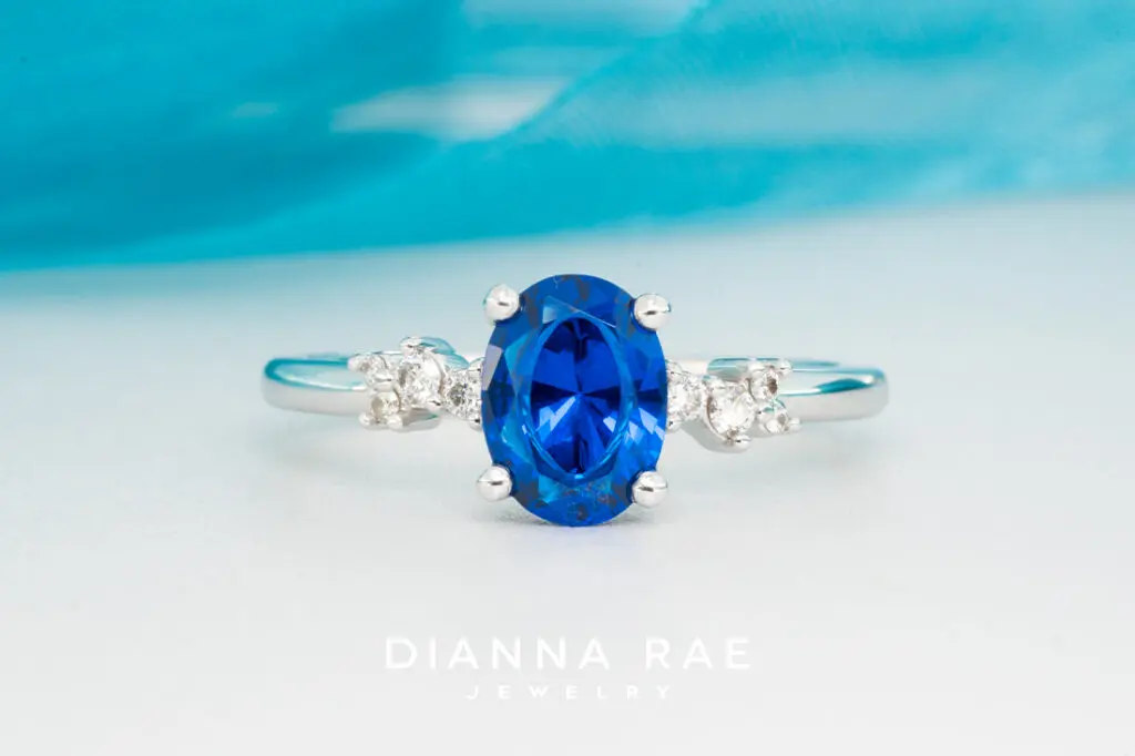 10K White Gold Blue Sapphire Ring with Diamond Accents