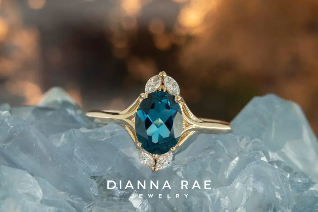 10K Yellow Gold Ring with Blue Topaz and Diamond accents
