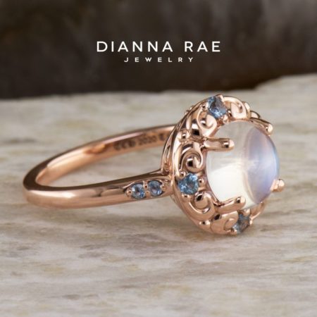 001-09142-001_STU72066_Rose-Gold-Round-Moonstone-Class-Ring-with-Aquamarine-Accents-and-Scroll-Halo_02-2