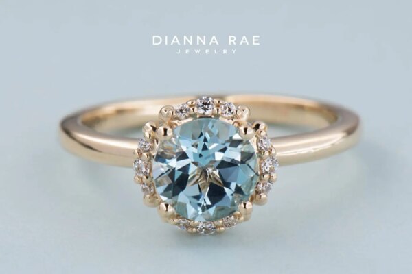 Yellow Gold Sky Blue Topaz and CZ Fashion Ring
