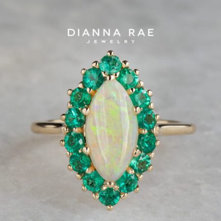 001-10659-001_STU_Yellow-Gold-Marquise-Shape-Australian-Opal-with-Round-Emerald-Halo-Cluster-Ring_01-1