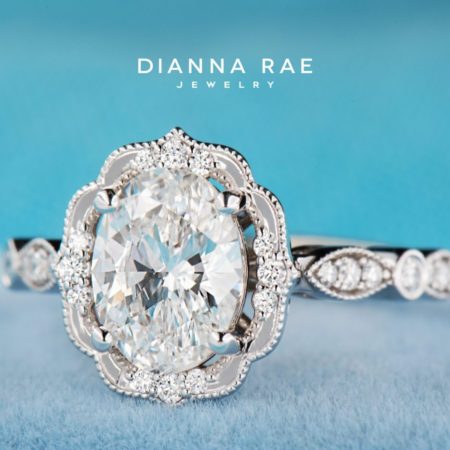 001-11406-001_DRJ_Daisy-Blossom-Petal-White-Gold-Oval-Diamond-Halo-Vintage-Engagement-Ring-with-Diamond-Milgrain-Accents_01