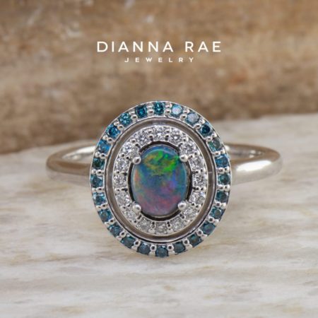001-200-00186_STU122087_White-Gold-Oval-Opal-Double-Halo-Fashion-Ring-with-White-and-Blue-Diamonds_02-1