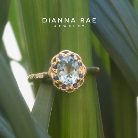 001-200-0268_DRJ-124288_Yellow-Gold-Aquamarine-Ring-with-Scalloped-Sapphire-Halo-Accent_01