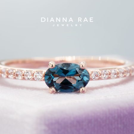 001-210-00061_STU122190_Rose-Gold-Oval-East-West-London-Blue-Topaz-Class-Ring-with-Cubic-Zirconia-Band-Stackable-Ring_01-1