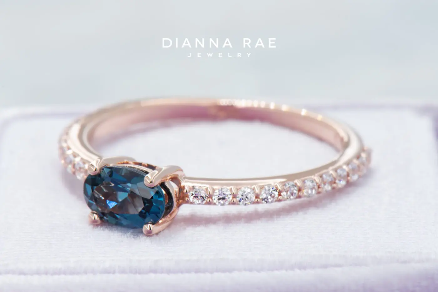 001-210-00061_STU122190_Rose-Gold-Oval-East-West-London-Blue-Topaz-Class-Ring-with-Cubic-Zirconia-Band-Stackable-Ring_02-1