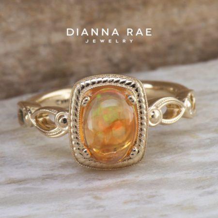 100-200-00187_STU122341_Yellow-Gold-Oval-Mexican-Opal-Ring-with-Gold-Halo-and-Milgrain_01-1