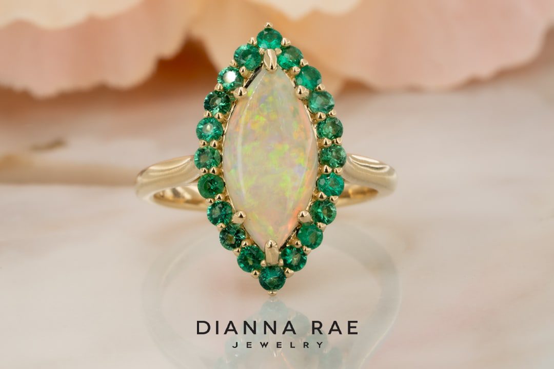 200-00437_DRJ-Cluster_Marquise-White-Opal-With-Emerald-Halo_01-1