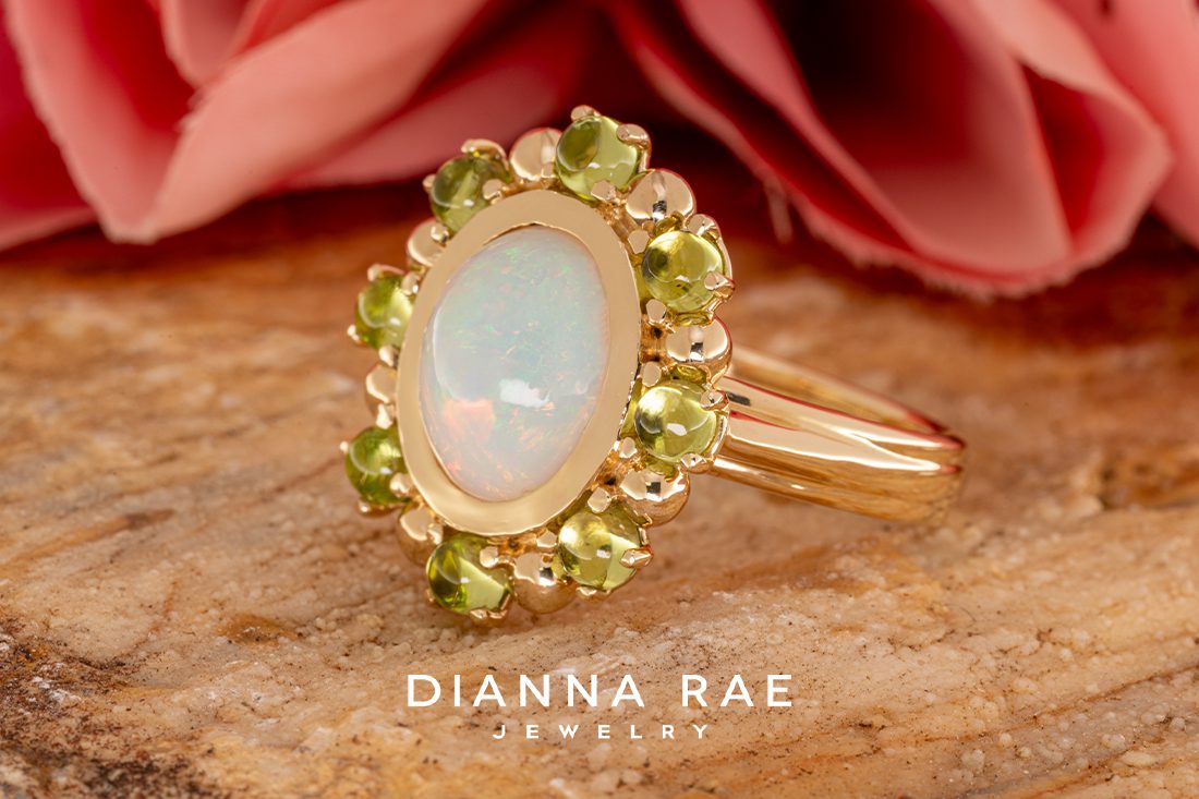 14K Yellow Gold Ring with Ethiopian Opal and a Peridot Halo