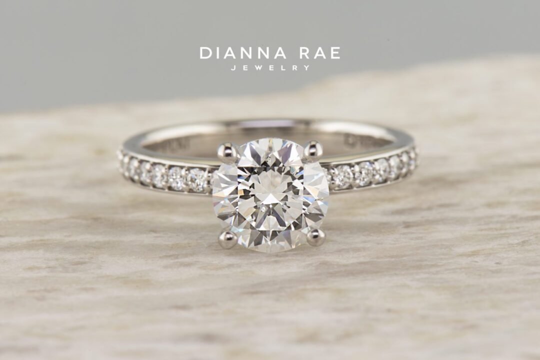 Platinum Round Diamond Solitaire Engagement Ring with Diamond Band
