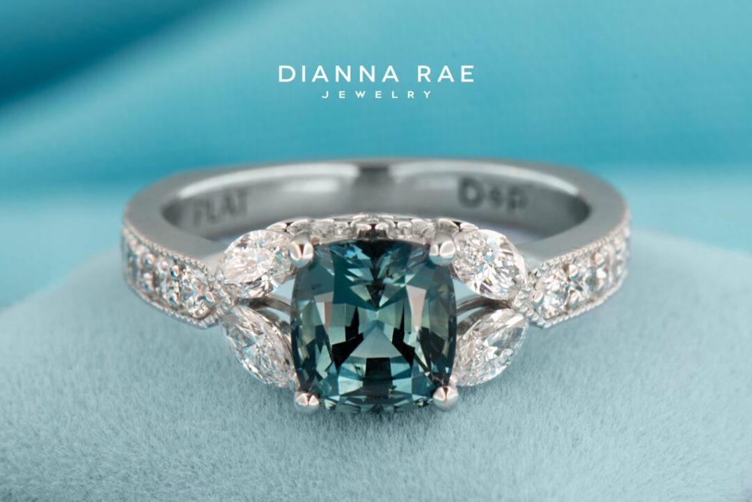 Platinum Cushion Sapphire and Diamond Engagement Ring