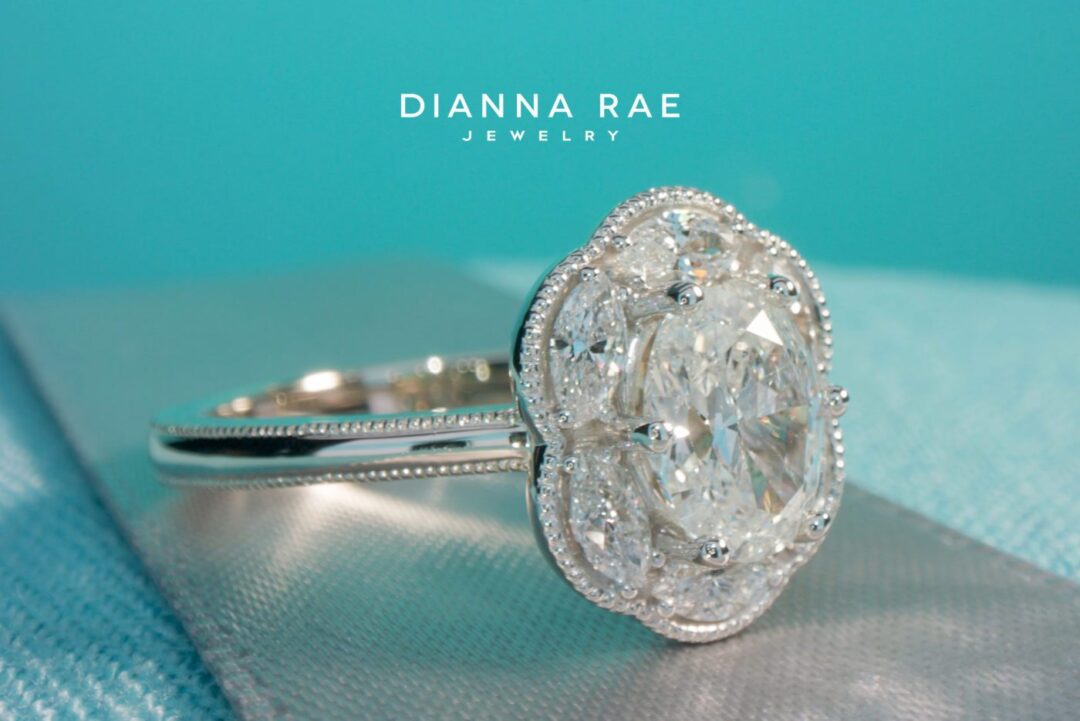 Wisteria - White Gold Oval Diamond Engagement Ring with Marquise Halo