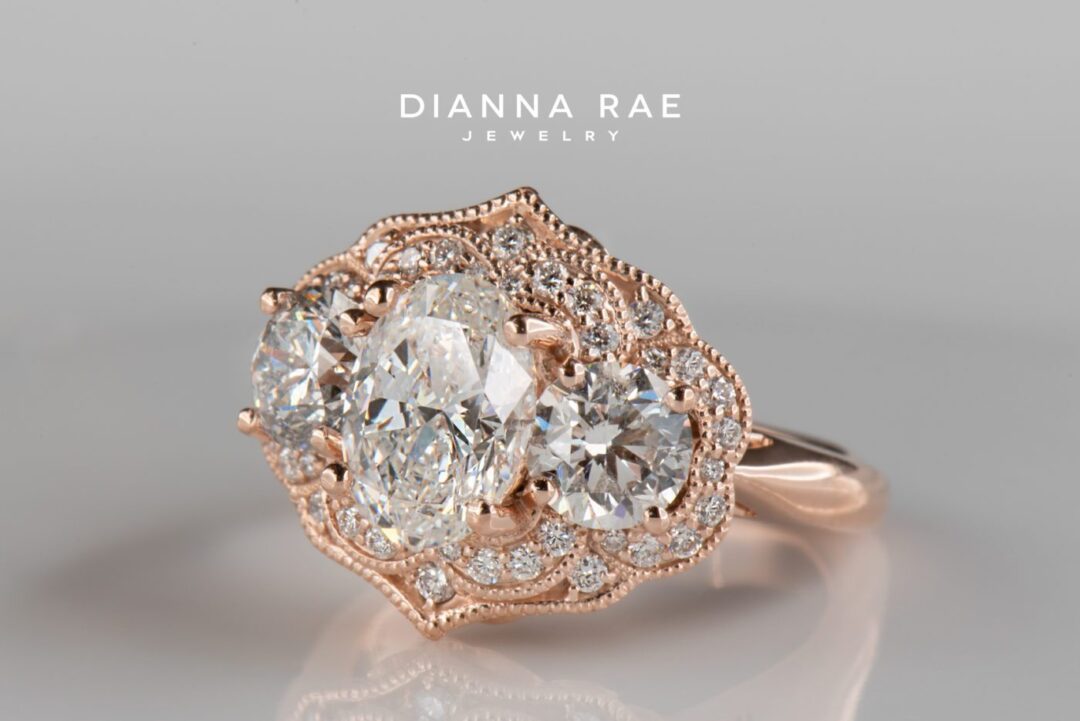 Rose Gold Three Stone Oval Diamond Halo Engagement Ring with Diamond Accents - Image 2