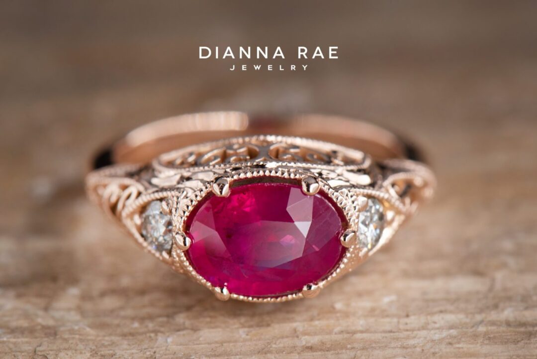 Rose Gold Oval Ruby East West Filigree Ring with Diamond Accents - Image 3