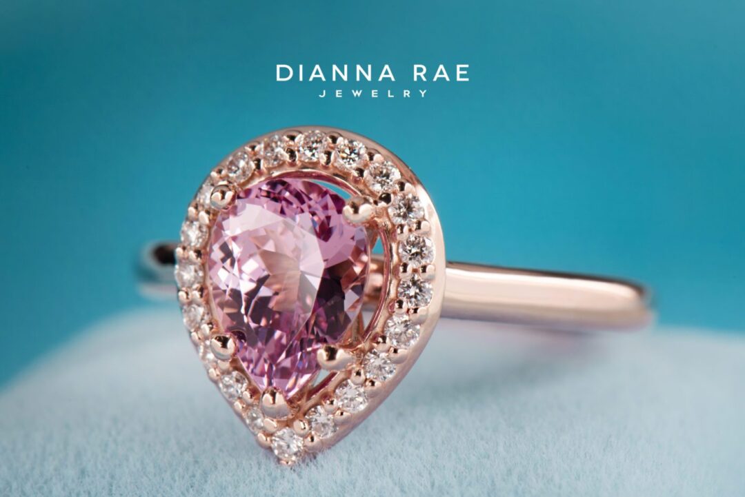 Rose Gold Pear-Shaped Lotus Garnet Halo Engagement Ring with Round Diamond Accents - Image 2