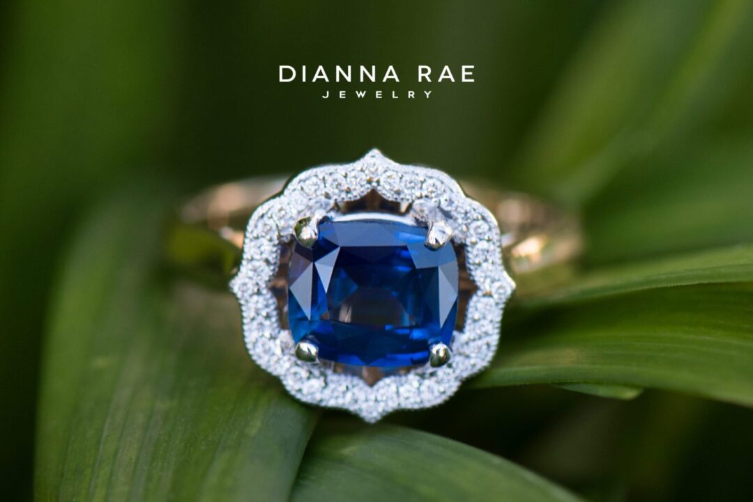 Two-Tone Blue Sapphire Ring with Diamond Halo
