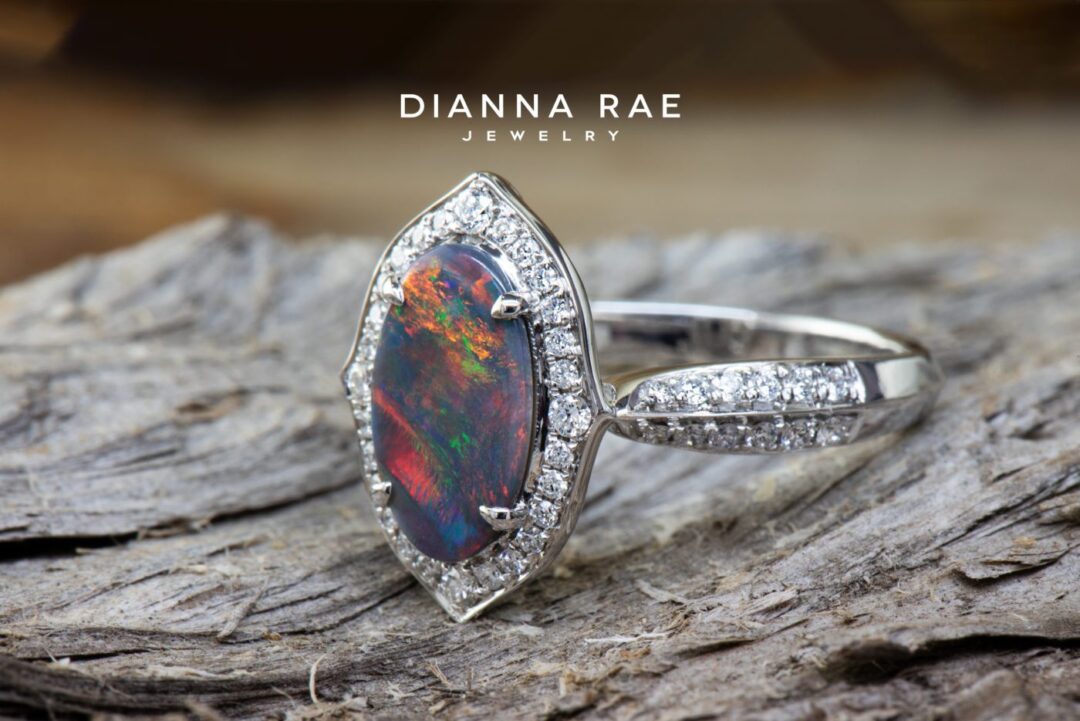White Gold Oval Black Opal Halo Ring with Diamond Accents