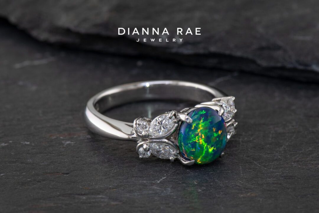 Platinum Round Black Opal Ring with Butterfly Diamond Design