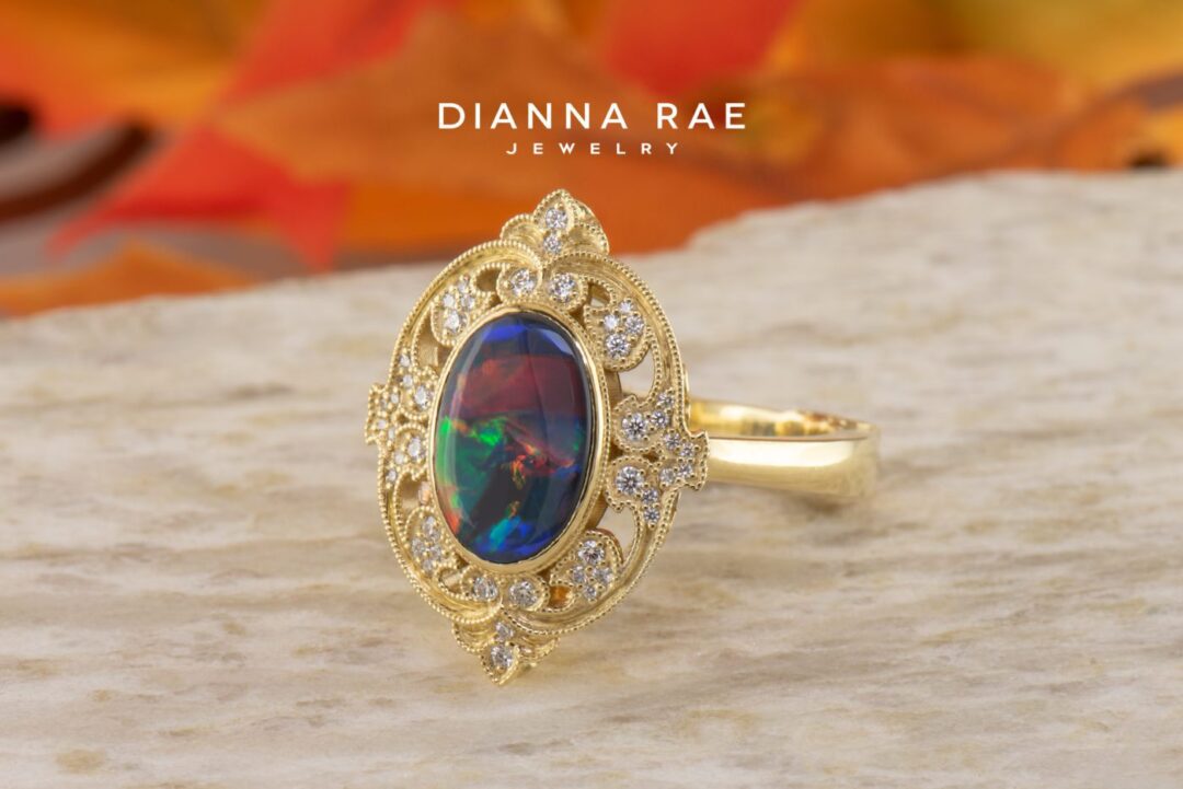 Opal Victoria - Yellow Gold Oval Black Opal Cocktail Ring with Diamond Filigree Accents