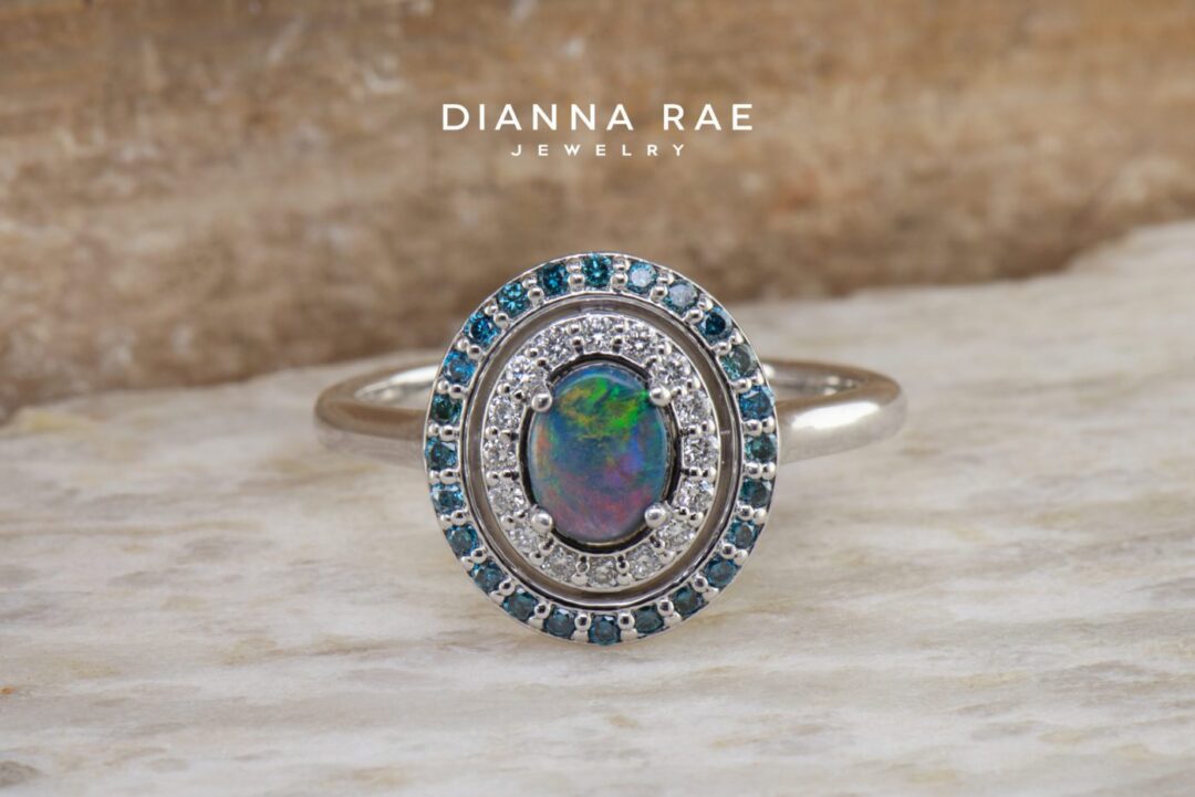 White Gold Black Opal Double Halo Ring with White and Blue Diamond Accents
