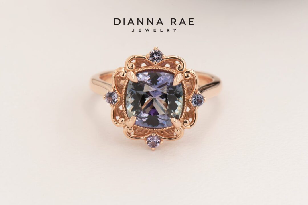 Rose Gold Cushion Peacock Tanzanite Ring with Garnet Accents