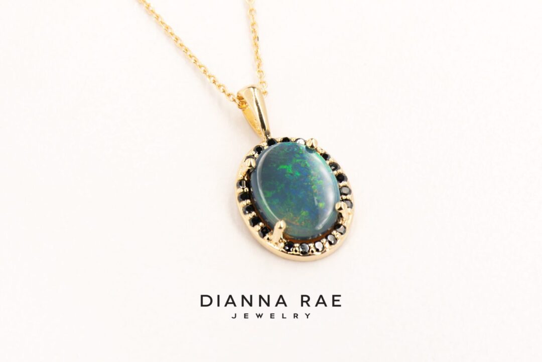 Yellow Gold Oval Black Opal Pendant with Black Diamond Halo - Image 2