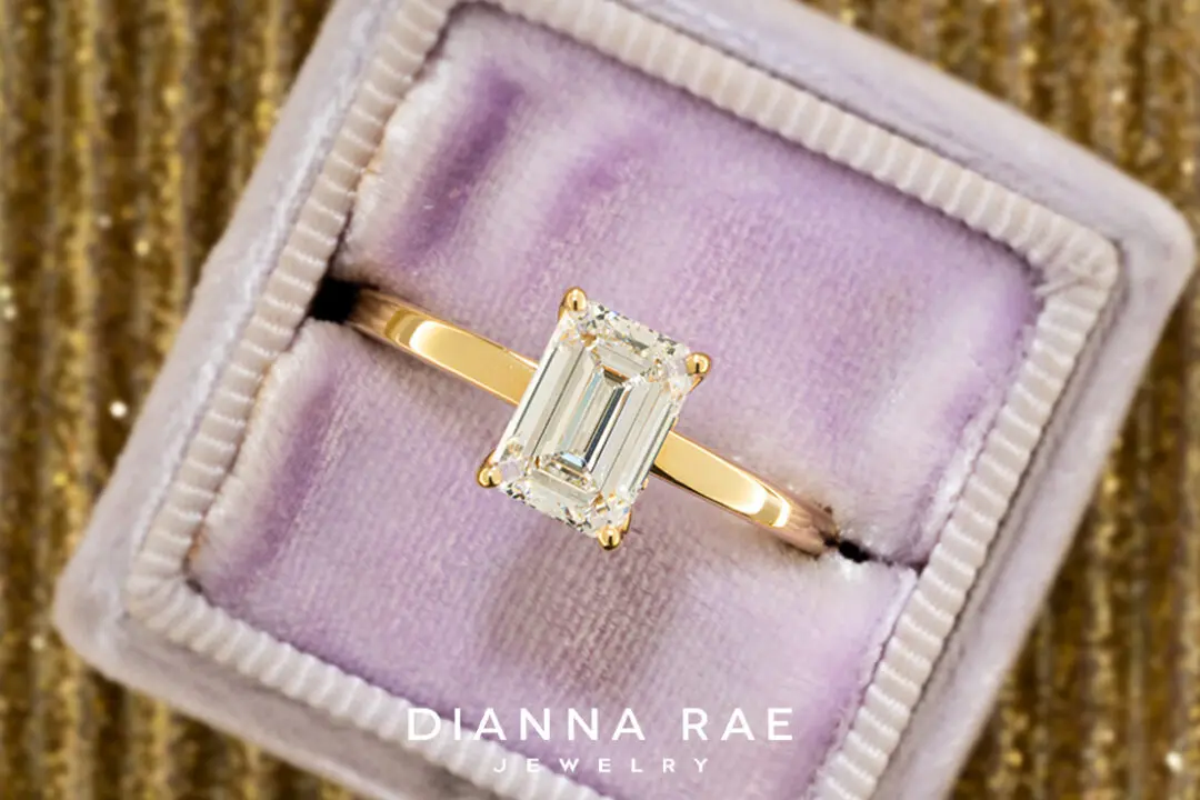 Emerald Cut Diamond Ring With Baguette Hidden Halo