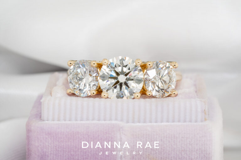 Home 14 Three Stone Round Diamond Ring
