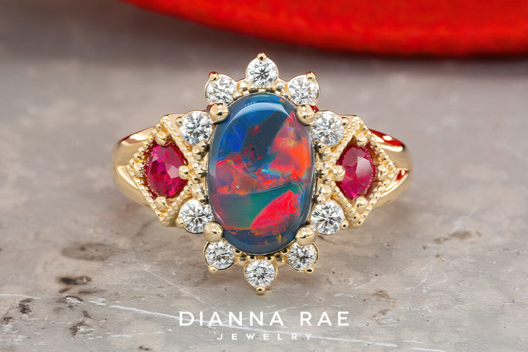 Black Opal & Ruby Ring with Diamond Halo