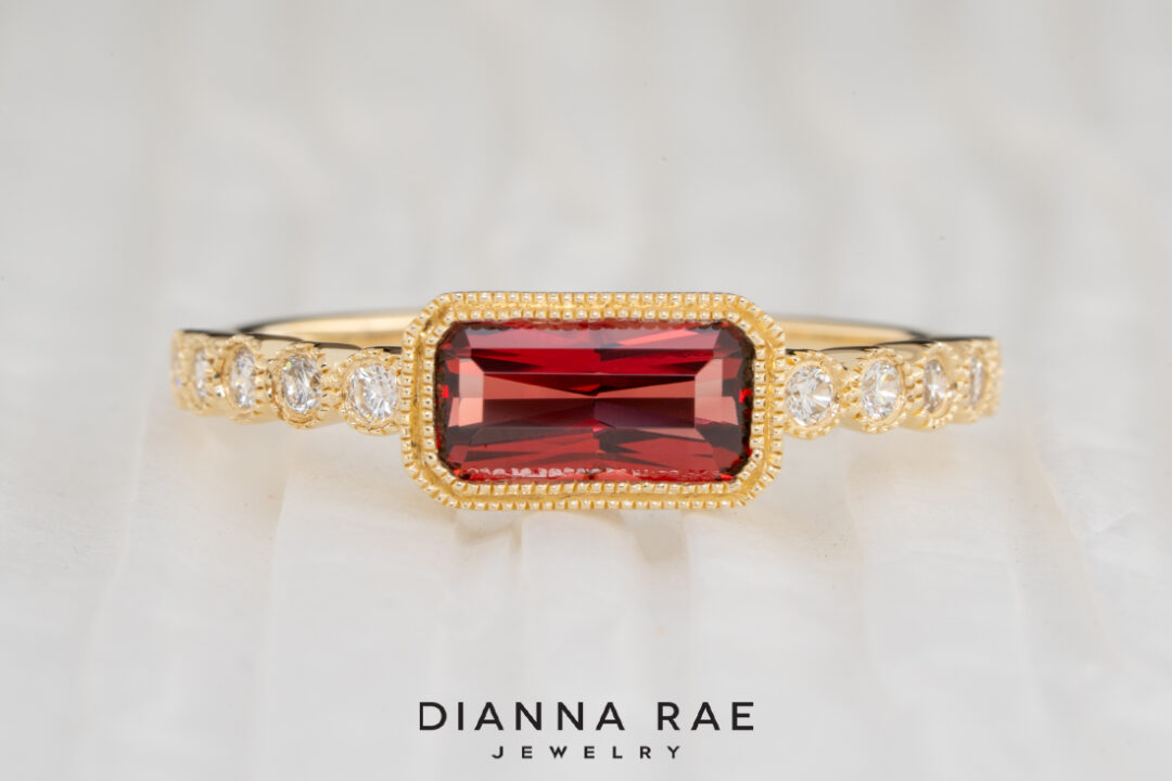 14K Yellow Gold Garnet Ring with Diamond Accents