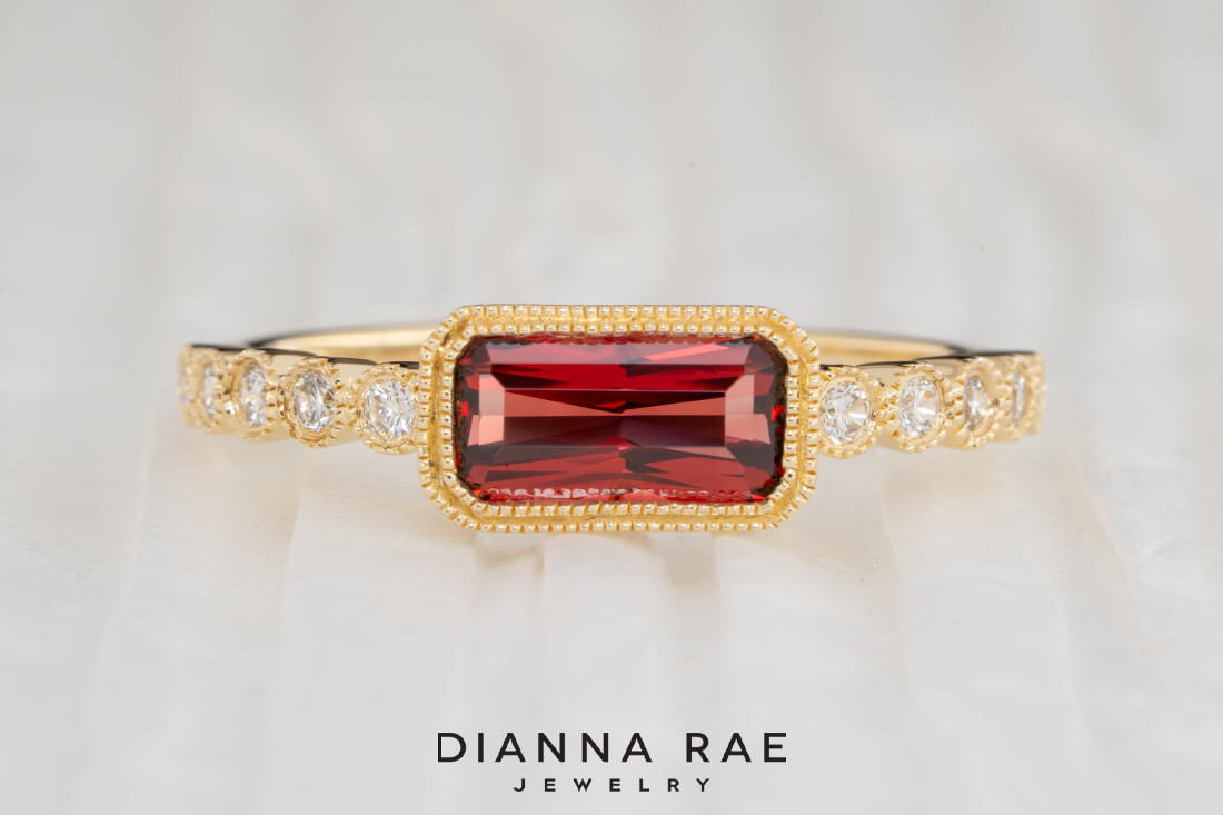 14K Yellow Gold Garnet Ring with Diamond Accents