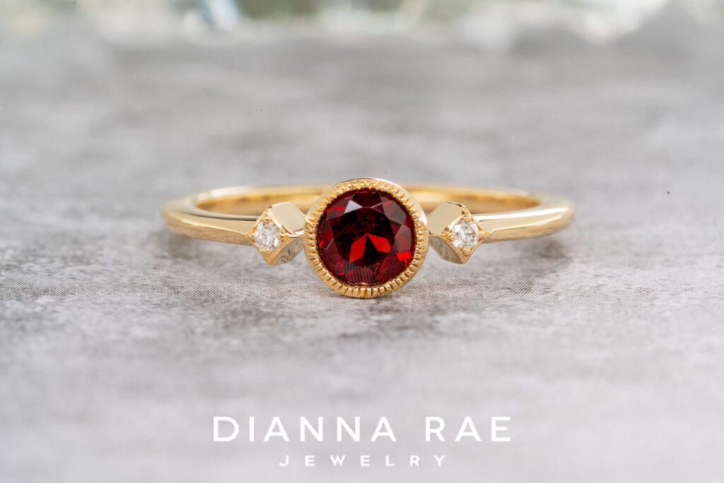 14K Yellow Gold Garnet Ring with Diamond Accents