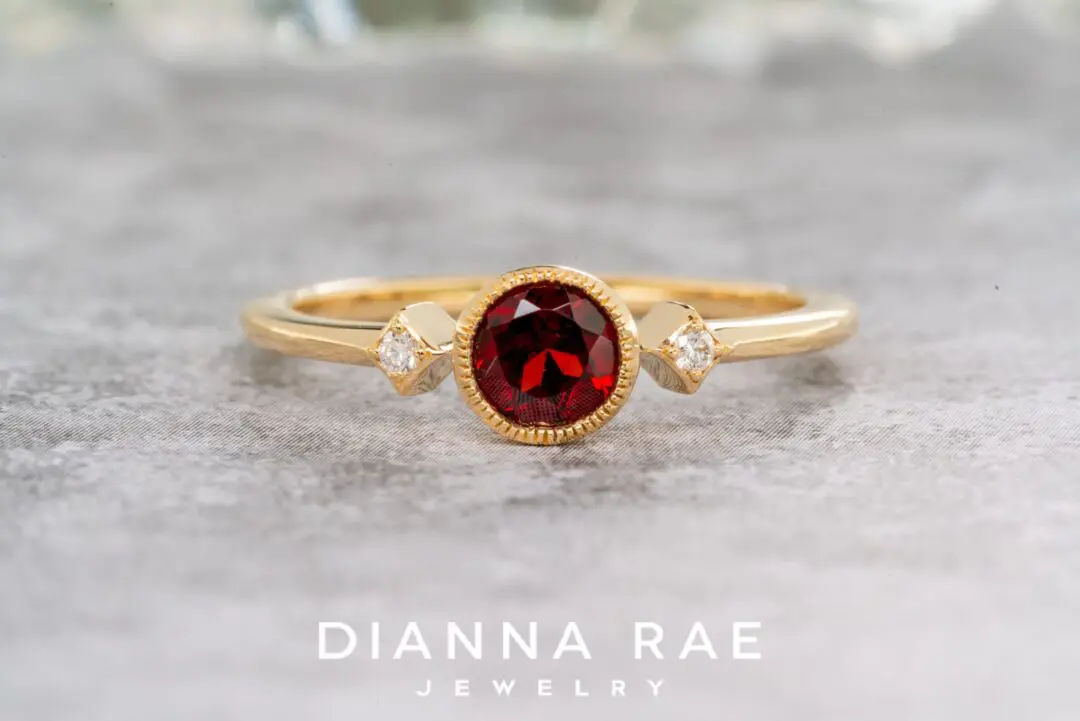 14K Yellow Gold Garnet Ring with Diamond Accents