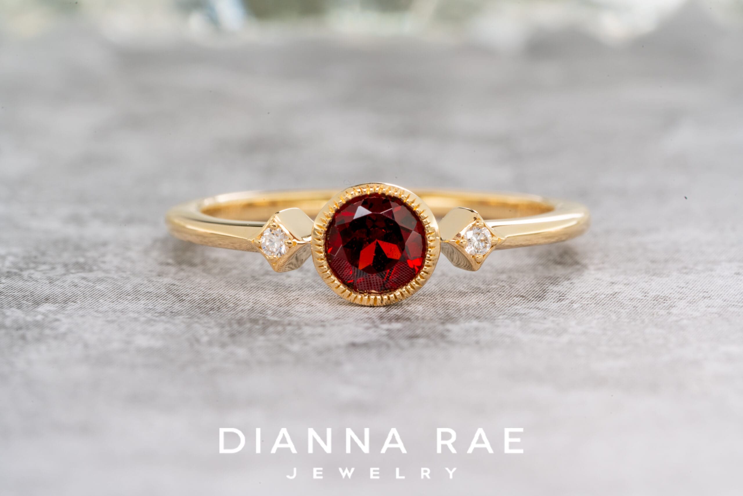 14K Yellow Gold Garnet Ring with Diamond Accents