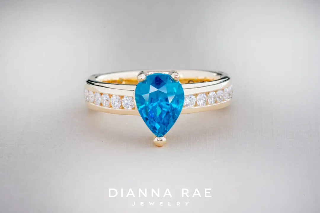 Blue Zircon Ring with Diamond Channel Set Band