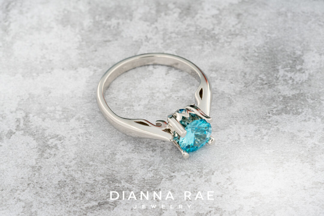 Blue Zircon Ring with Blue Diamond Accents - Image 3