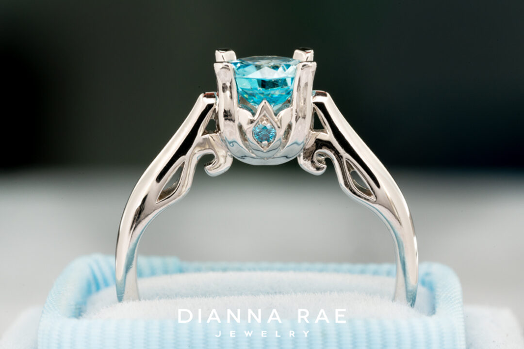 Blue Zircon Ring with Blue Diamond Accents - Image 2