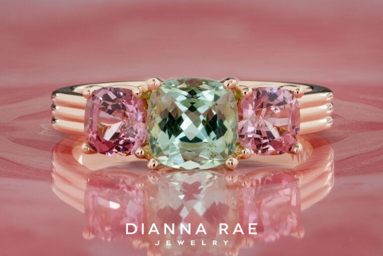 Green Tourmaline Ring with Pink Garnet Side Stones