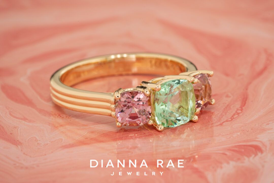 Green Tourmaline Ring with Pink Garnet Side Stones - Image 2