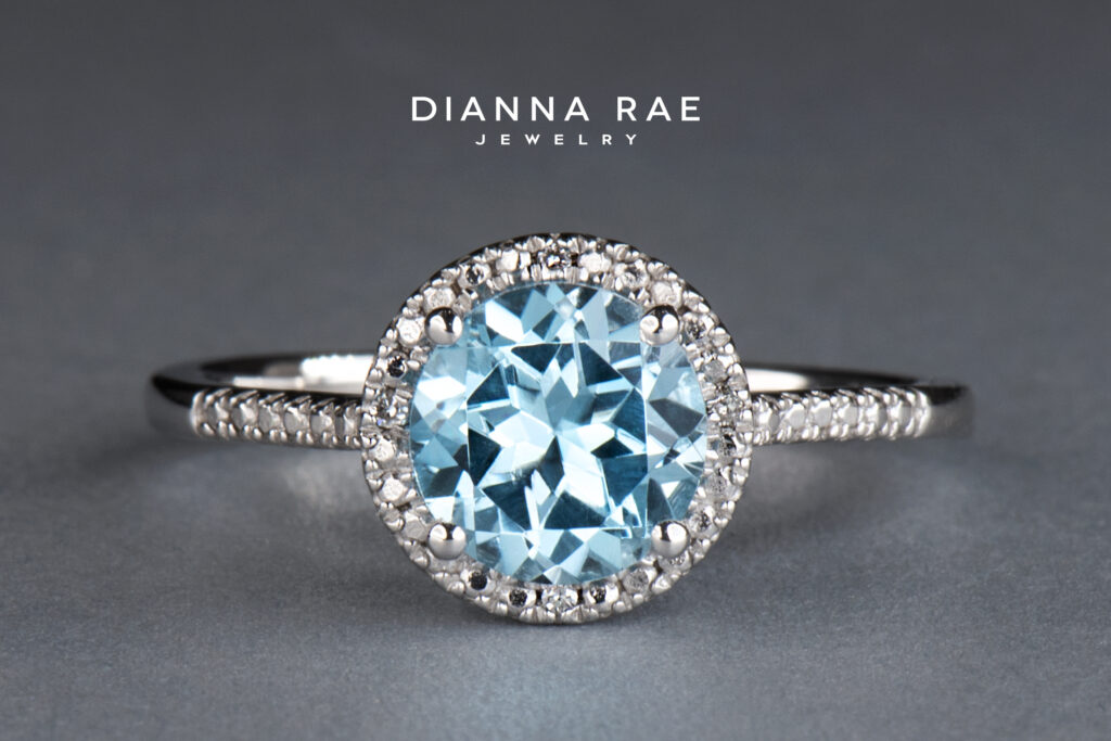 Sterling Silver Round Sky Blue Topaz and Diamond Ring