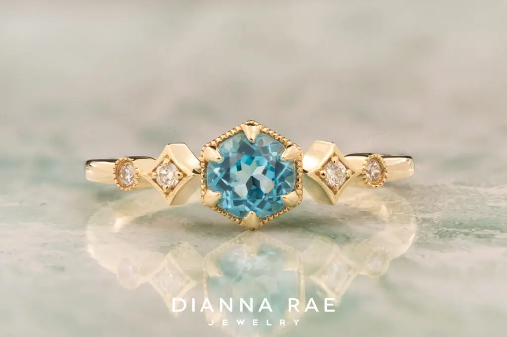14K Yellow Gold Blue Topaz Ring with Accented Band