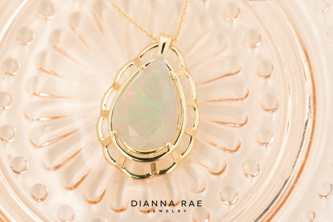 14k Yellow Gold Faceted Pear Shape Ethiopian Opal Pendant - Image 2