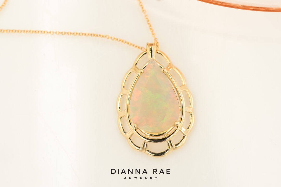 14k Yellow Gold Faceted Pear Shape Ethiopian Opal Pendant