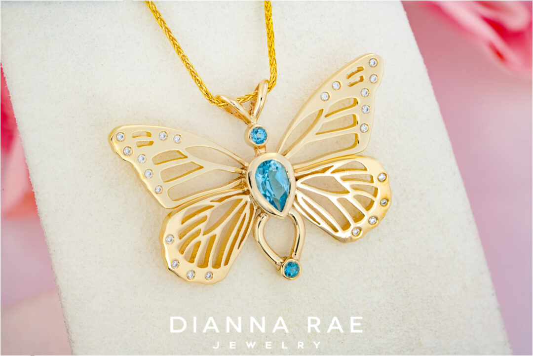 Blue Topaz and Diamond Butterfly Pendant