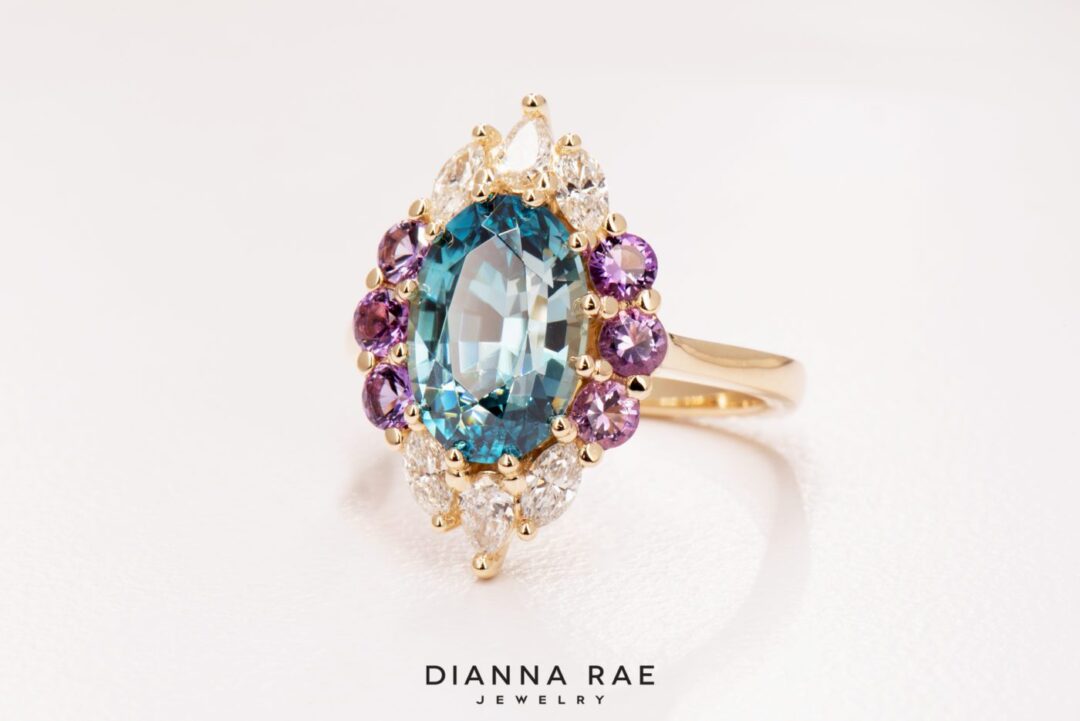 Oval Blue Zircon Ring with Diamond Halo - Image 4