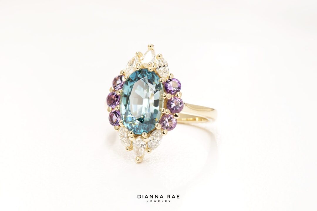 Oval Blue Zircon Ring with Diamond Halo - Image 9