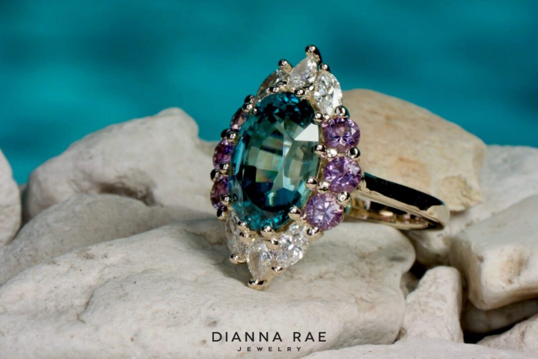 Oval Blue Zircon Ring with Diamond Halo - Image 3