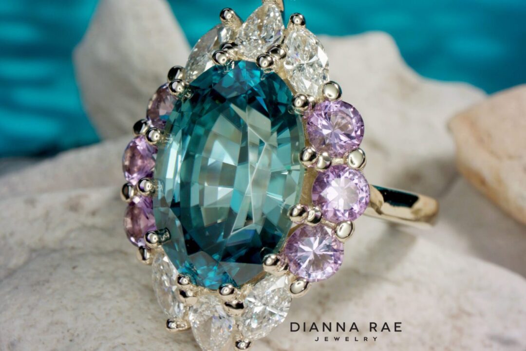 Oval Blue Zircon Ring with Diamond Halo - Image 5